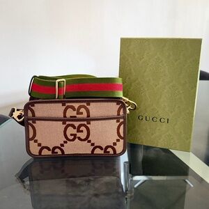 Gucci Jumbo GG mini camera bag from the GUCCI Love Parade Collection. Authentic